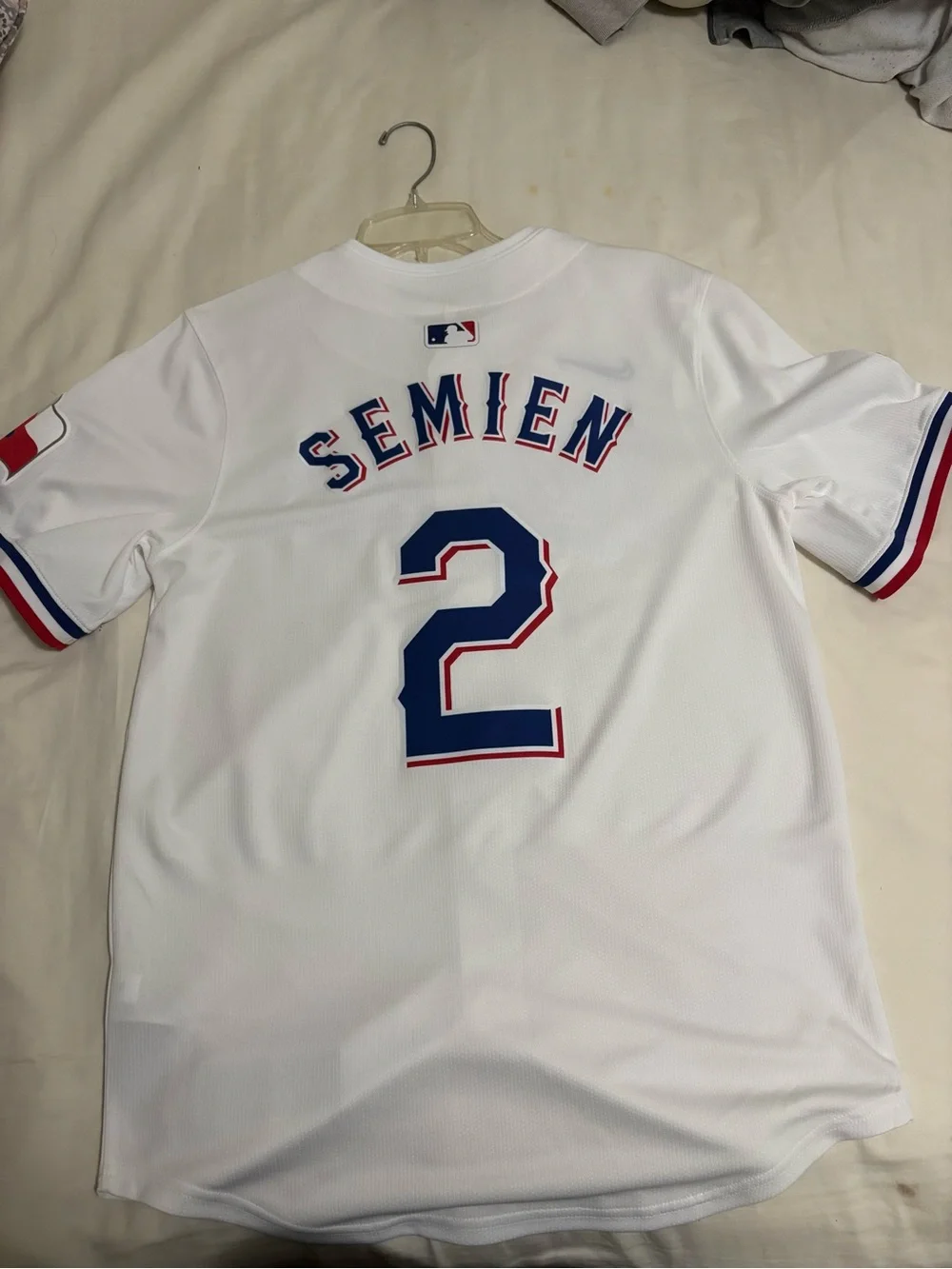Nike White Baseball Jersey with Blue Swoosh